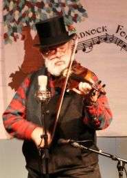 Hunt playing "Mr. Fezziwig's Ball" at the Nelson Solstice Party, 2009. Photo by Val van Meier. Hunt playing "Mr. Fezziwig's Ball" at the Nelson Solstice Party, 2009. Photo by Val van Meier.